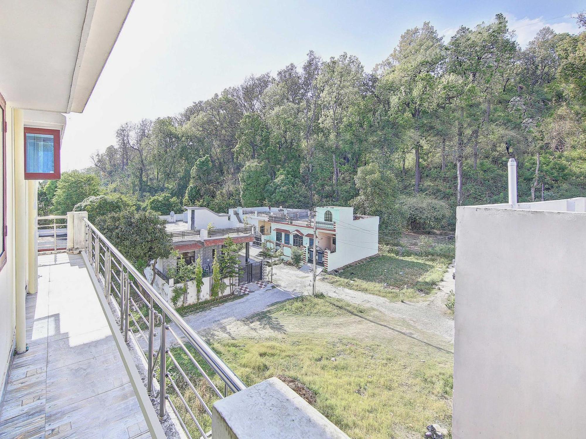 โอโย โฮม 78802 พลาชี ภาวัน ฌัชรา Apartment Jhajra ภายนอก รูปภาพ
