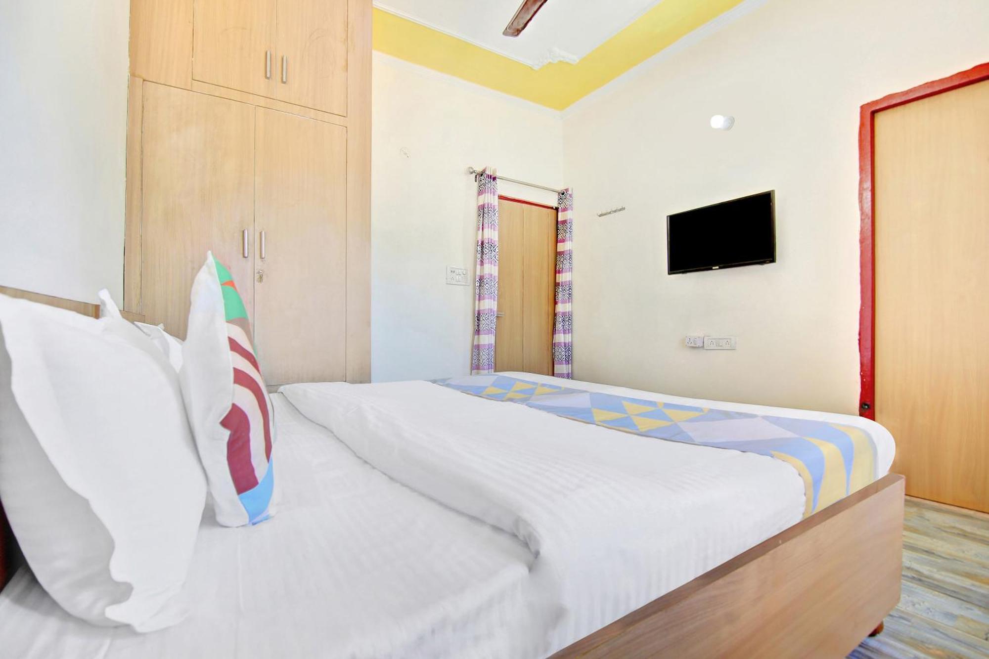 โอโย โฮม 78802 พลาชี ภาวัน ฌัชรา Apartment Jhajra ภายนอก รูปภาพ